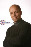 Scott H headshot-approved by Byron Allen w-logo copy.jpg